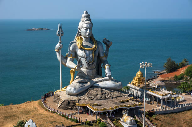 Hindu god statue, lord Shiva sculpture sitting in meditation India